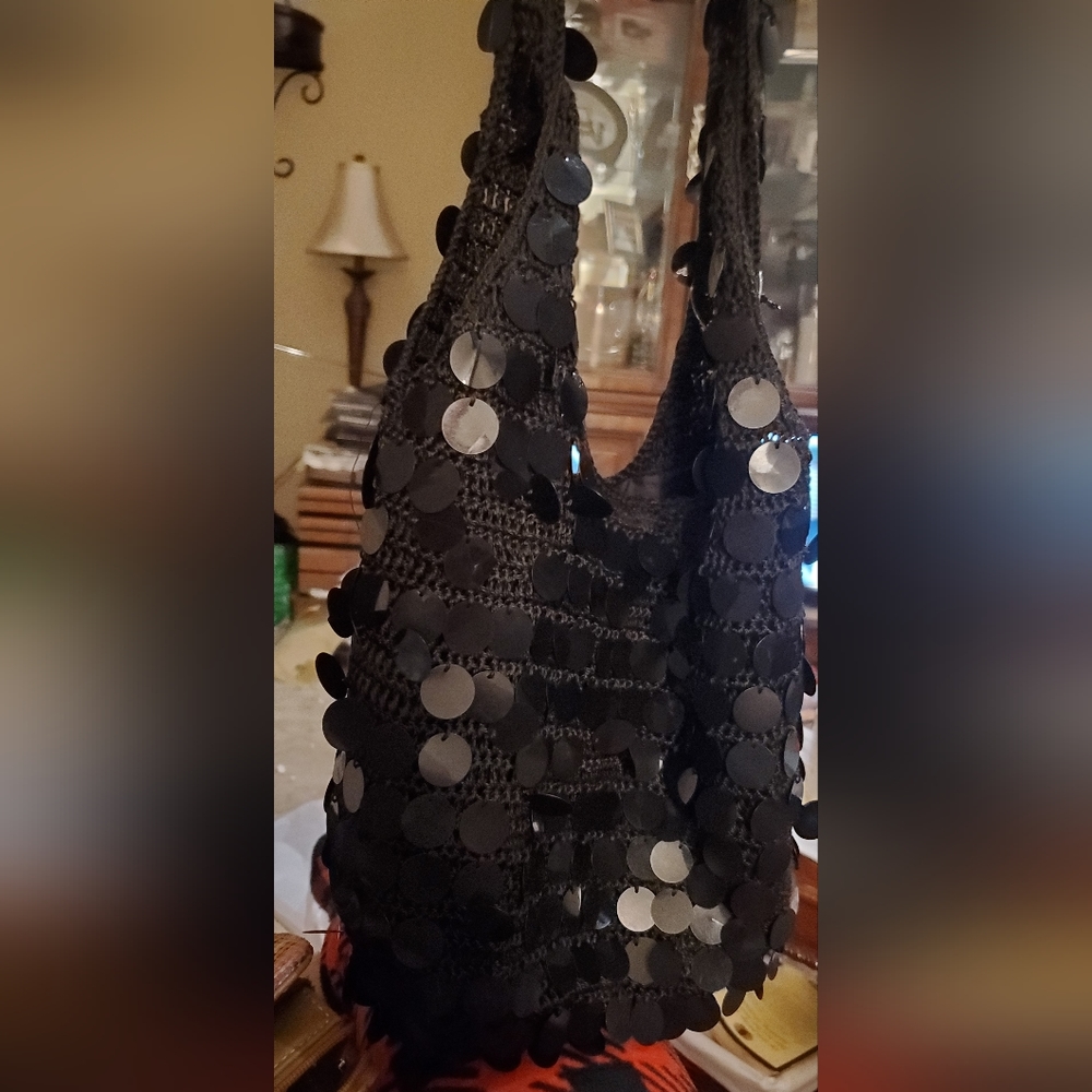 Chateau sequined crochet black bag.  Dress up your look w sleek and pretty bag.